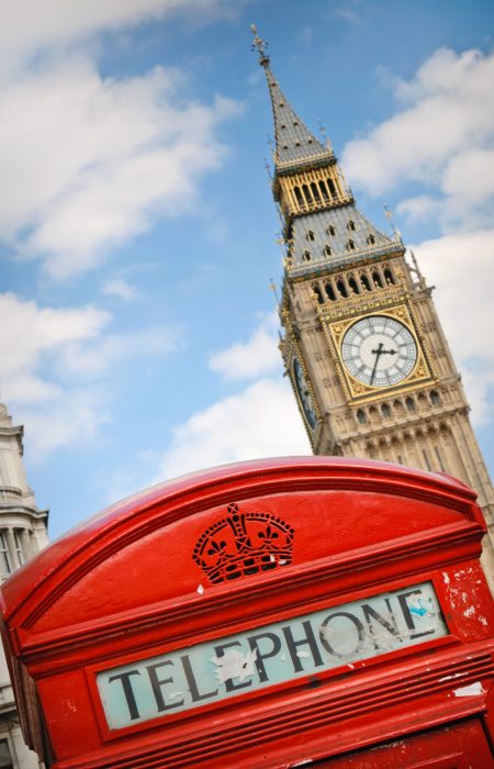 Why Invest in the UK – Advantage Investments. Iconic London landmarks with Big Ben and a red telephone booth, symbolizing investment opportunities in the UK.